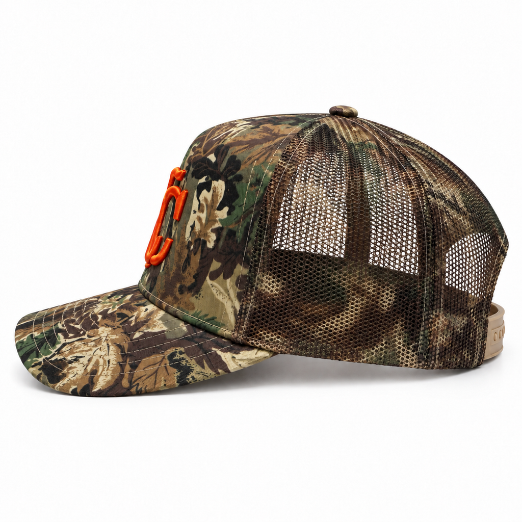 Crunk Cowboy green camo trucker cap with orange logos, opposite side view